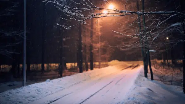 a road covered in snow during winter