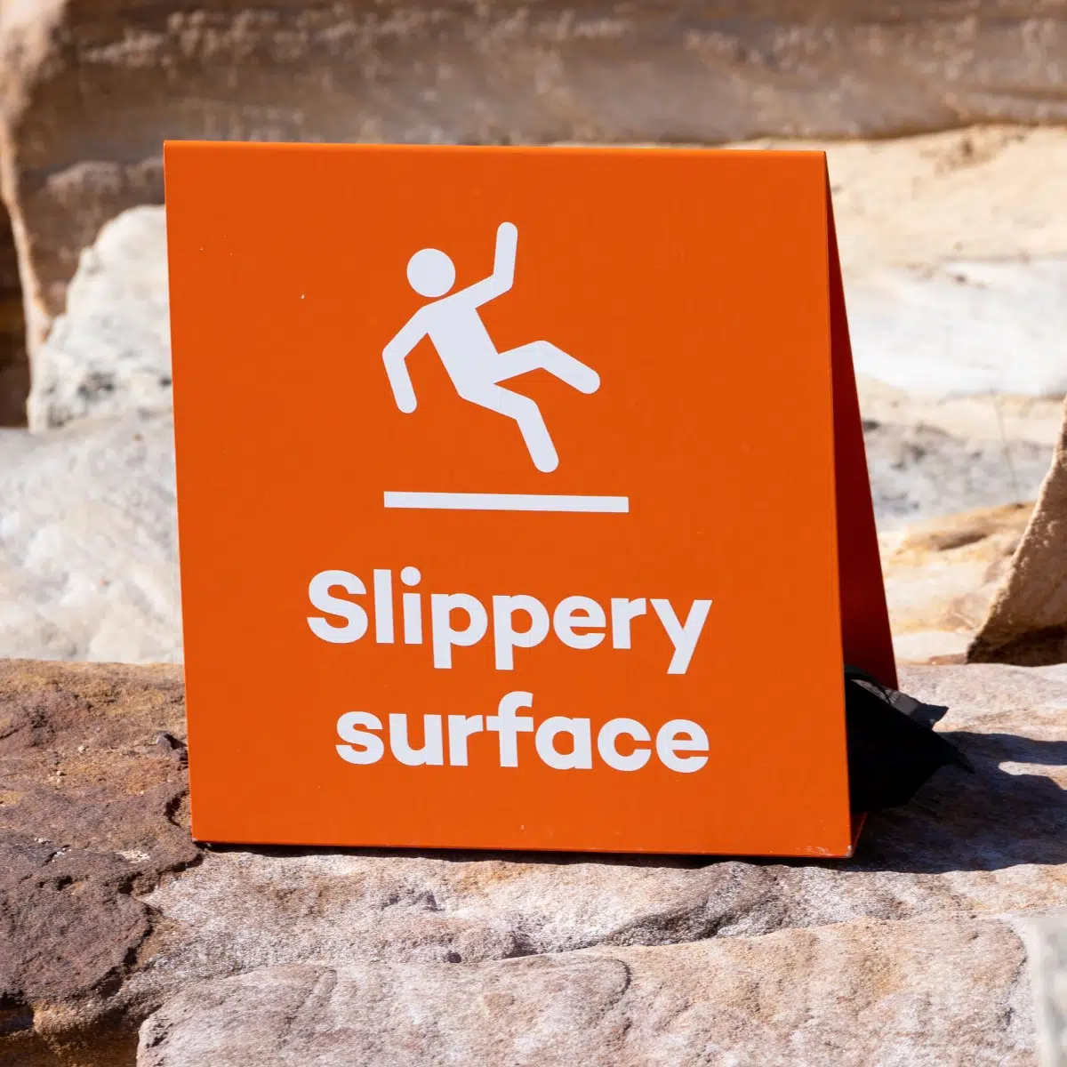 a slippery surface sign